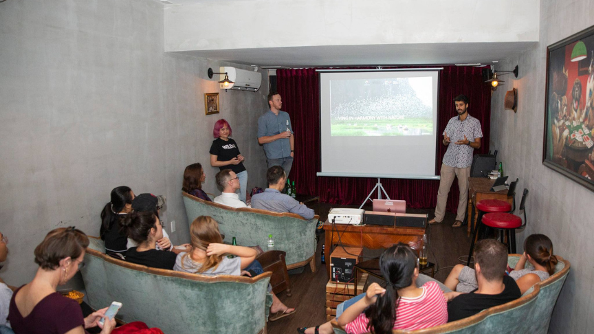 Ameer speaking at an event in Vietnam