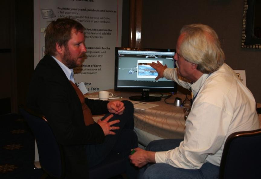 Ferdinand discussing online learning options with a client